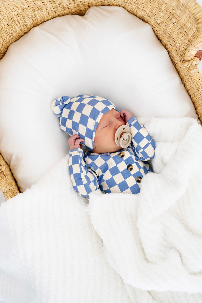 jett newborn boy in knotted gown and matching jett top knot hat