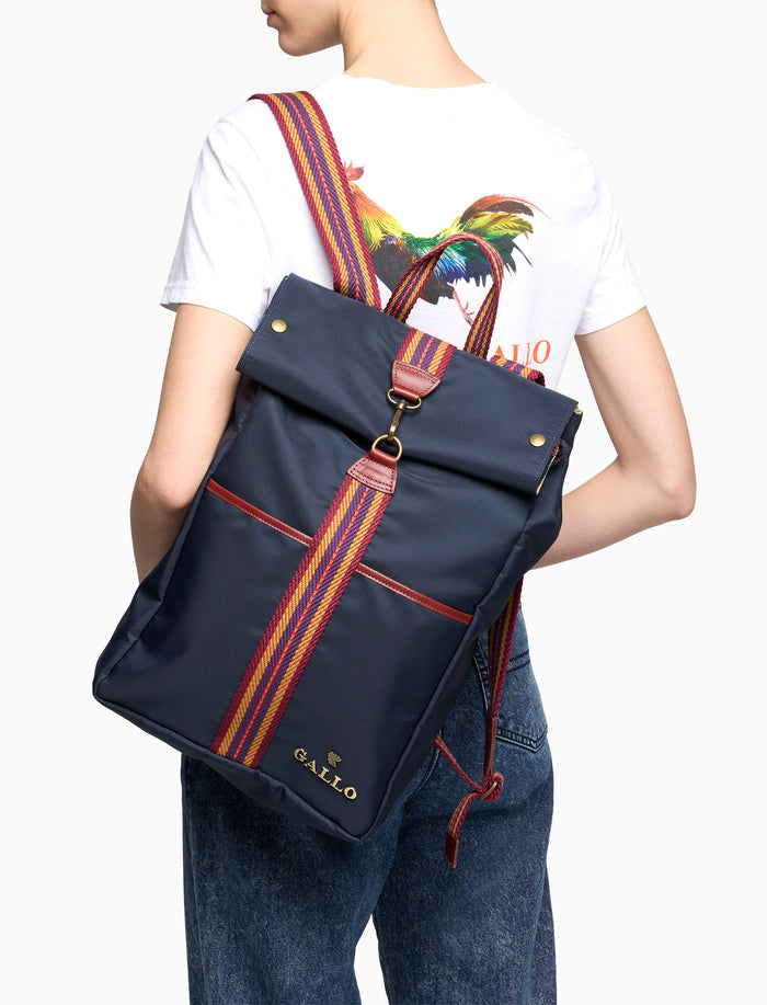 Zaino unisex tinta unita blu con nastro spigato ed inserti in pelle