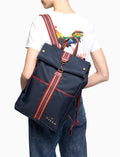 Zaino unisex tinta unita blu con nastro spigato ed inserti in pelle